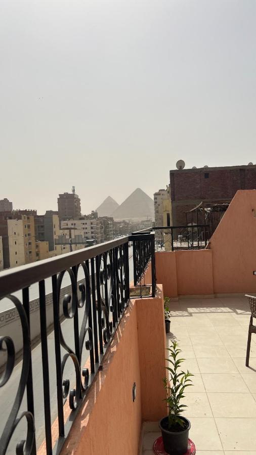 Pyramids Road Guest House Cozy Rooms And Rooftop Breakfast With The Pyramids View Nazlet el-Sîsi Extérieur photo