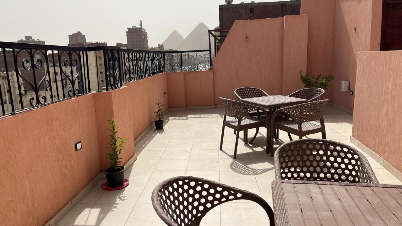 Pyramids Road Guest House Cozy Rooms And Rooftop Breakfast With The Pyramids View Nazlet el-Sîsi Extérieur photo