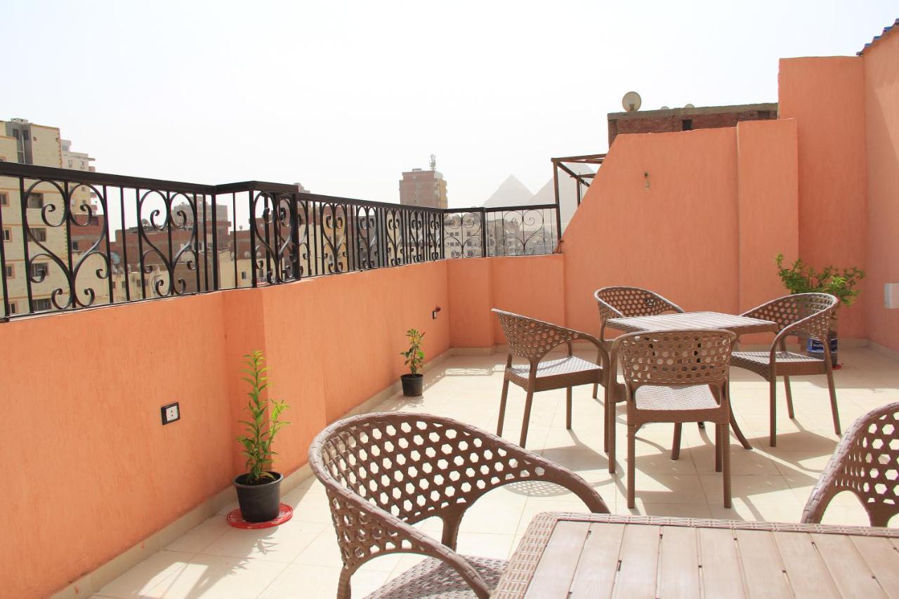 Pyramids Road Guest House Cozy Rooms And Rooftop Breakfast With The Pyramids View Nazlet el-Sîsi Extérieur photo