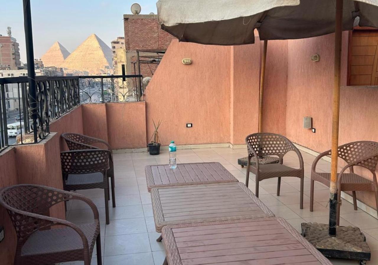 Pyramids Road Guest House Cozy Rooms And Rooftop Breakfast With The Pyramids View Nazlet el-Sîsi Extérieur photo